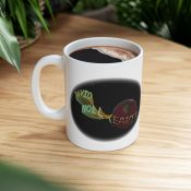 - David Noll dot Earth Ceramic Mug, (11oz, 15oz) - 12 - Davidnoll.earth https://davidnoll.earth/wp-content/uploads/2025/01/david-noll-earth-white-mug-context-11oz.jpg
